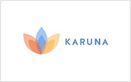 A logo of the company karuna.